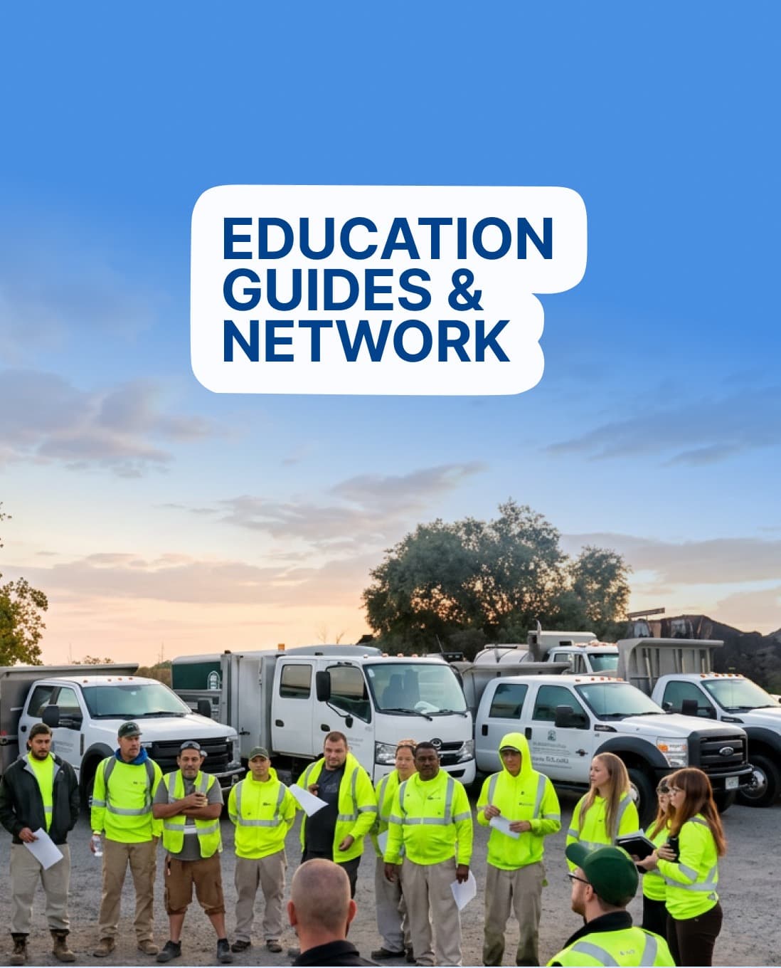 Whiteboard reading “Education Guides & Network” in front of a training group